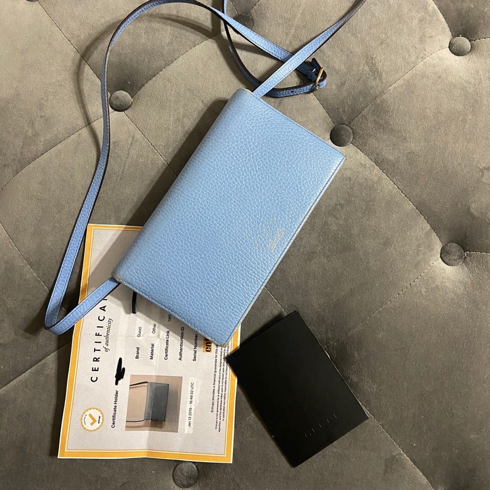Gucci Swing wallet on a strap